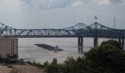 A barge goes under the Interstate 20 bridge
